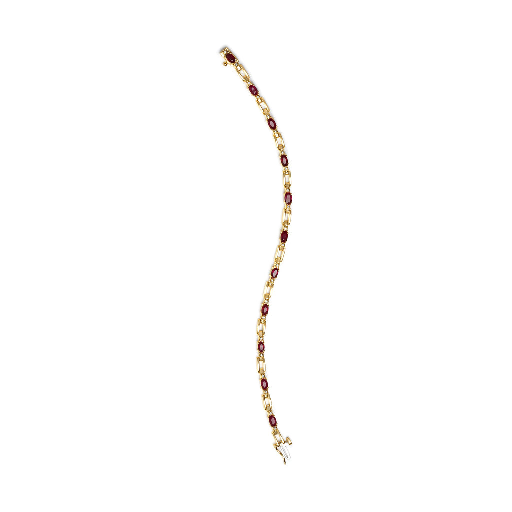 10K Yellow Gold Oval Ruby and 1/10 Cttw Diamond Bar Prong Set Bracelet (H-I Color, SI1-SI2 Clarity) - 7" Length