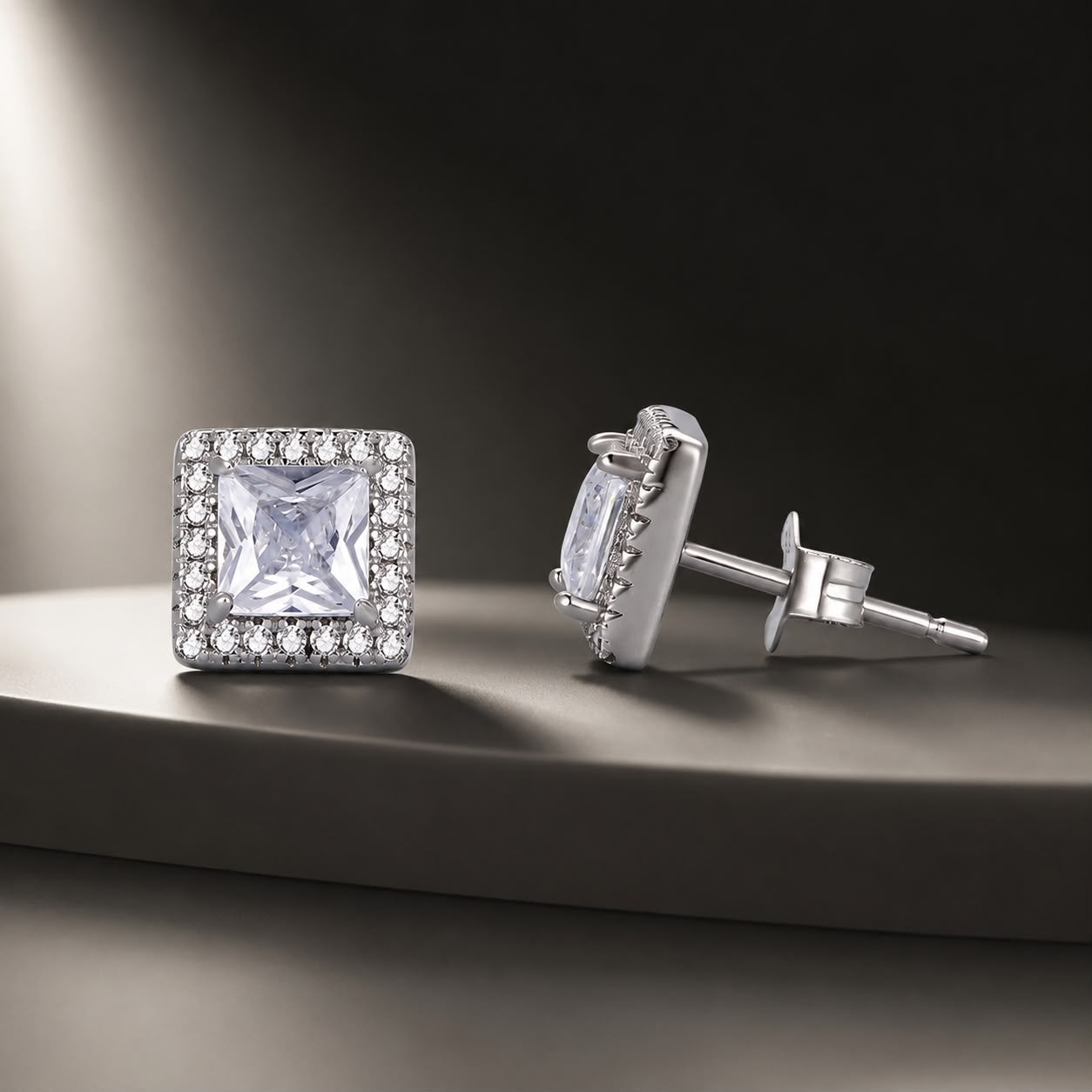 925 Sterling Silver Earrings with Pavé Setting CZ and Platinum Plating.