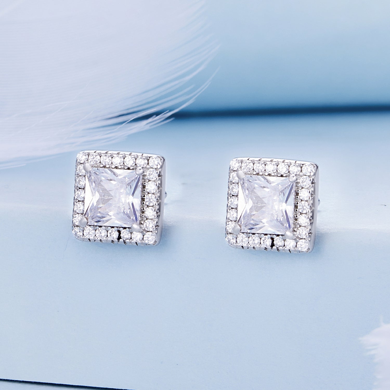 925 Sterling Silver Earrings with Pavé Setting CZ and Platinum Plating.
